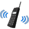 Gif of a black brick phone that occasionally shakes and rings